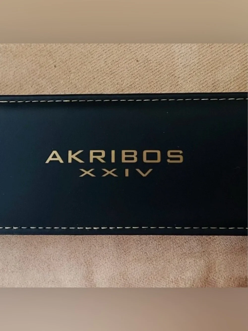 Akribos XXIV Black and Silver Radiant Caseback Watch
